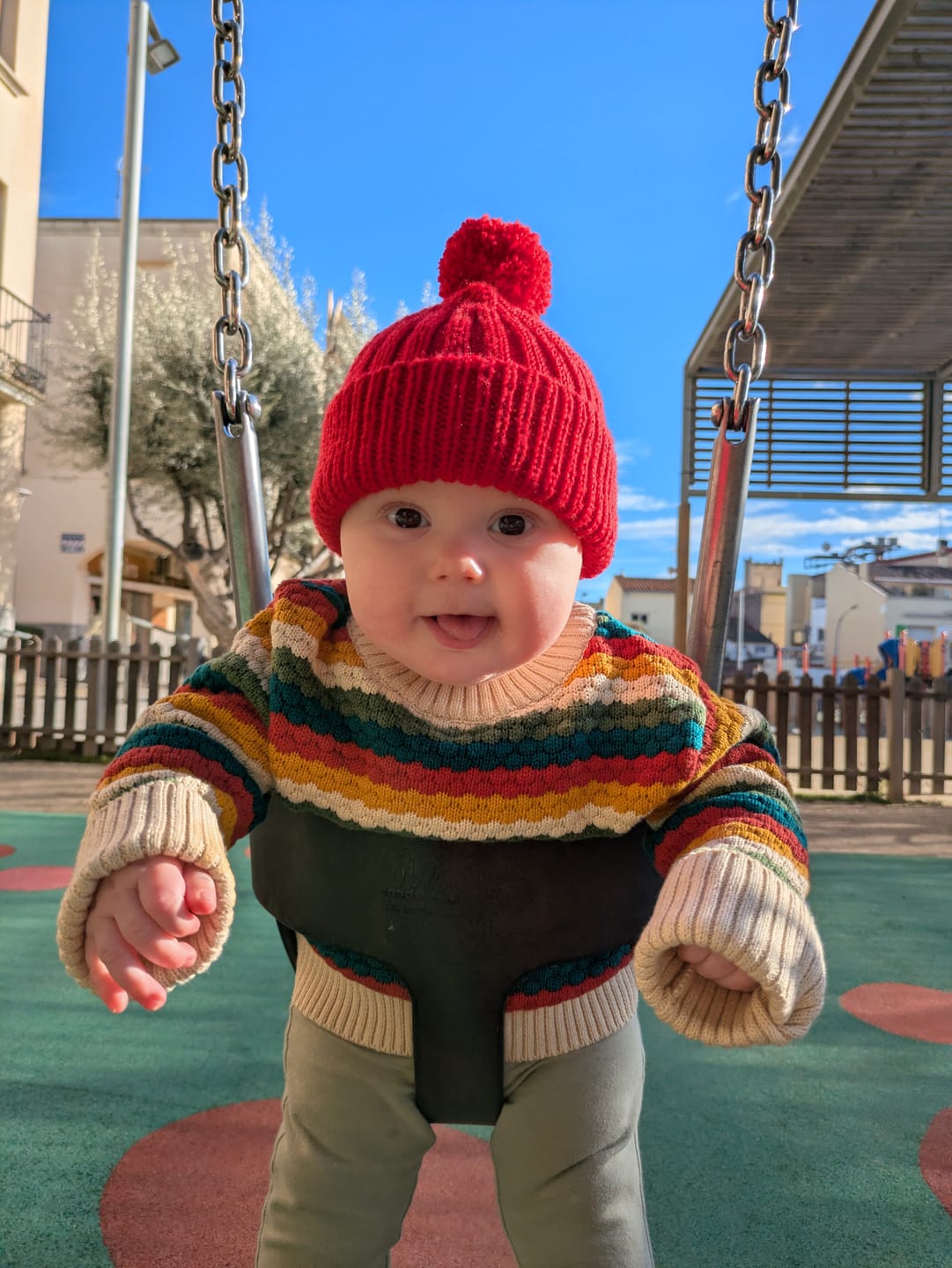Customer photo review of From One To Another Honeycomb Rainbow Striped Snuggly Knitted Jumper