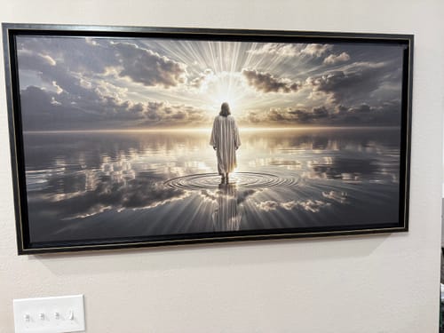 Customer's Tailor Canvas print of Jesus walking on water, shown in a black frame on their dining room wall.
