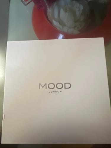 Customer's white box from MOOD LONDON containing the Spray Box Set.