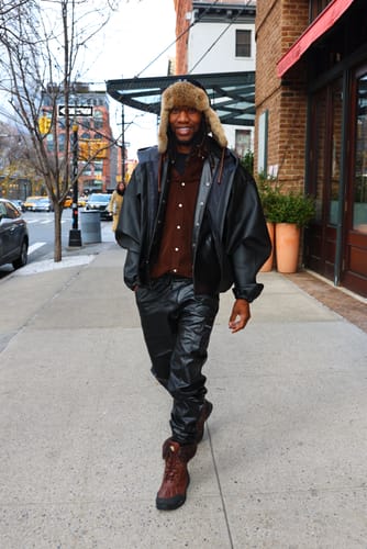 Customer photo review of Thickened PU Stitching Small-leg Leather Pants