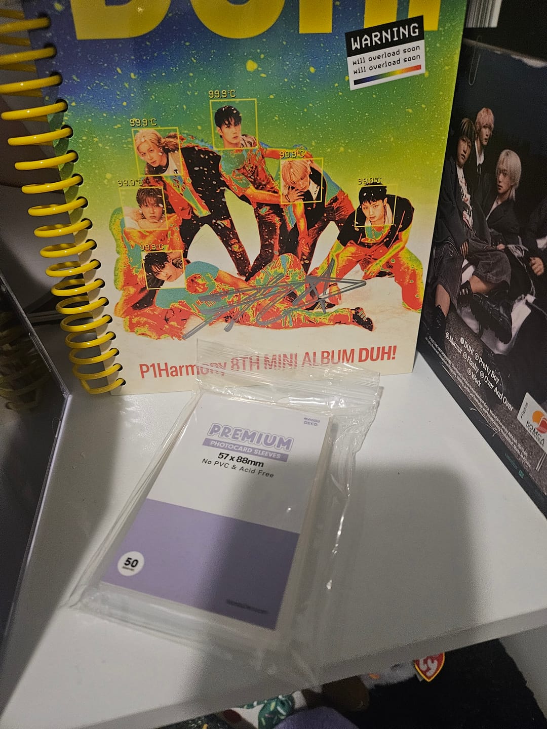 Customer photo review of PREMIUM PHOTOCARD SLEEVES - PURPLE VERSION (57x88MM)