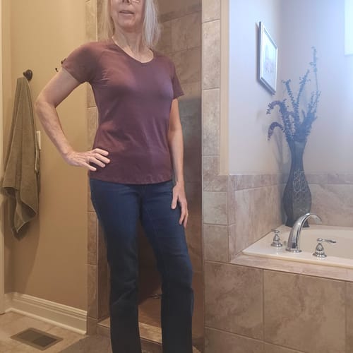 Reviewer wearing the Mia V Neck in Grape Harvest to show its comfortable fit.