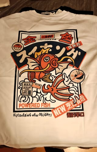 Customer's white Koi King T-Shirt laid flat, showing the detailed Japanese-inspired koi fish graphic.