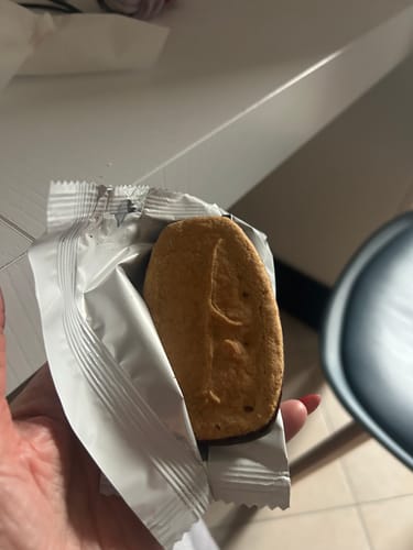 Customer photo review of Biscotti proteici Nuvole ricoperti di cioccolato e arancia