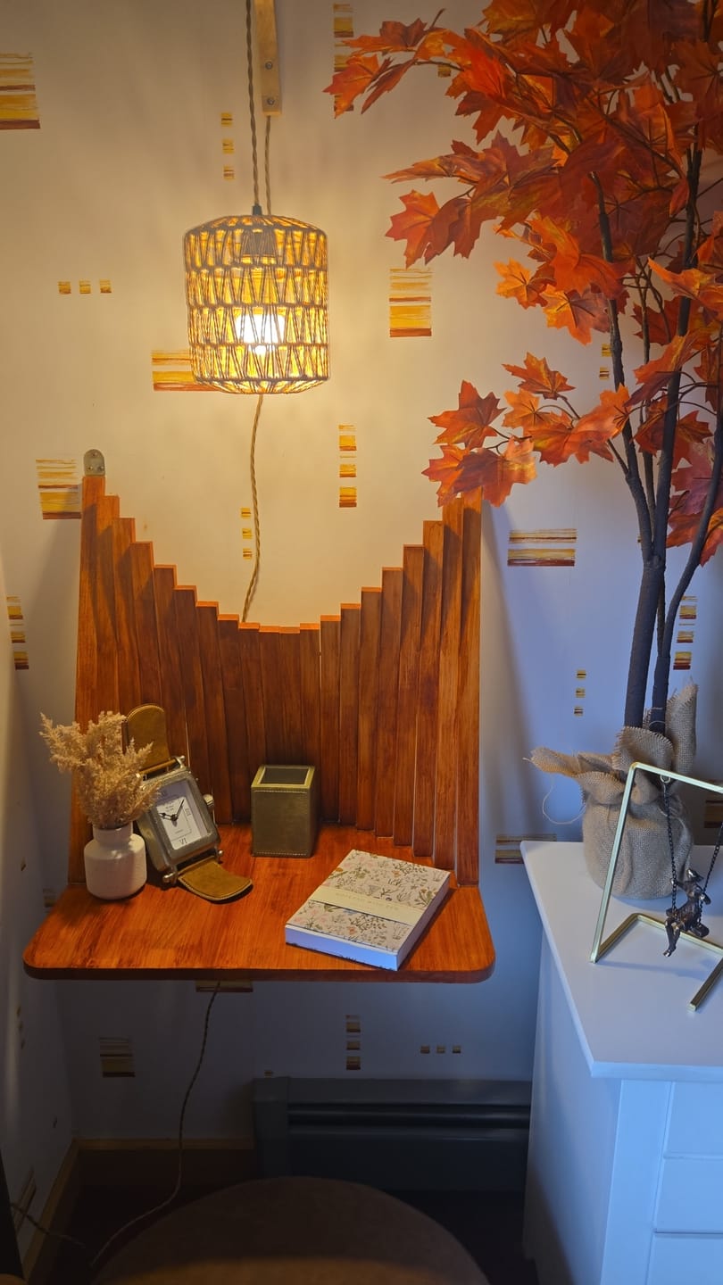 A wall shelf nook stained a warm amber shade indoors