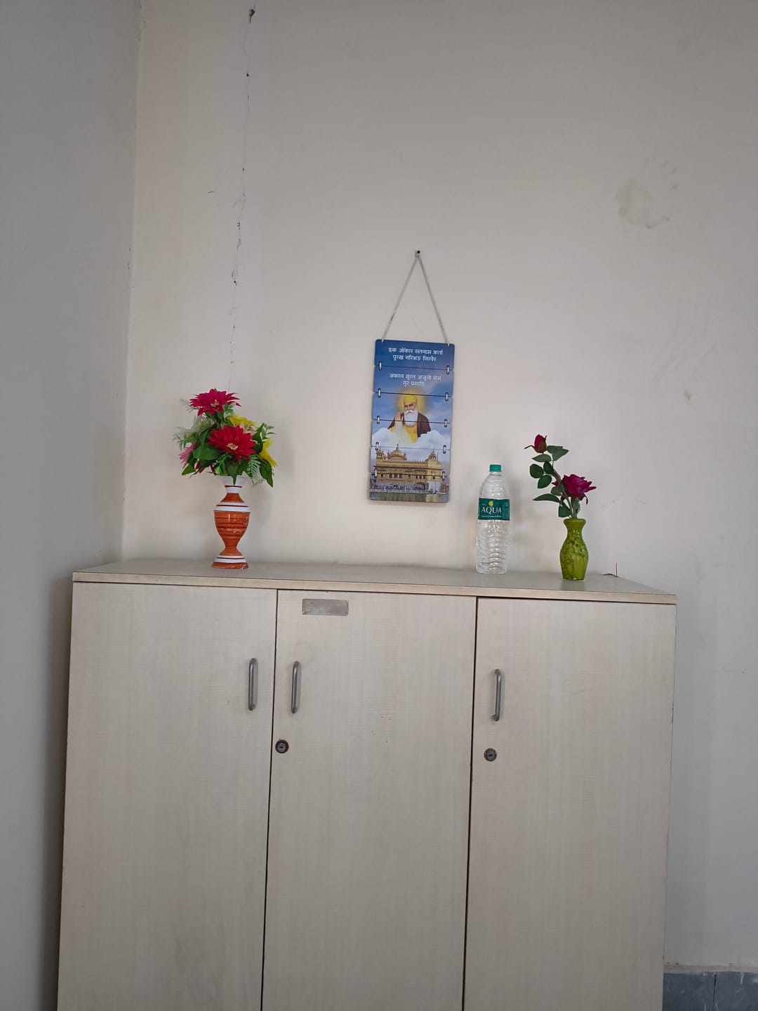 Customer photo review of Guru Nanak Dev Ji Wooden Wall Hanging 9×18"