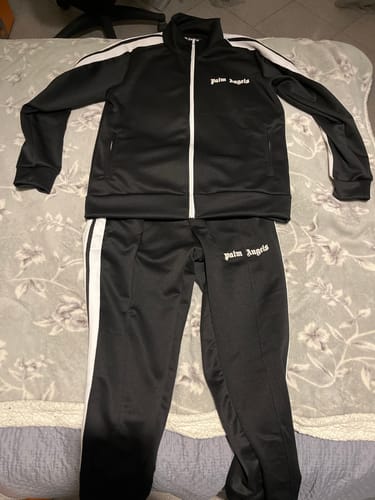 Recensione con foto di un cliente su Tuta Palm Angels