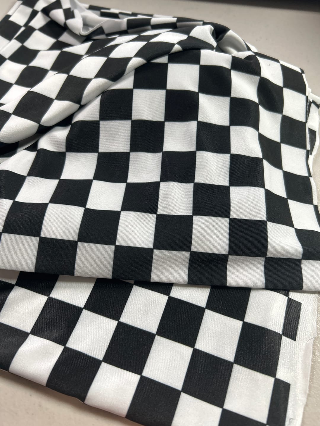 Customer photo review of Black White Checkerboard Lycra Stretch Fabric by the Metre
