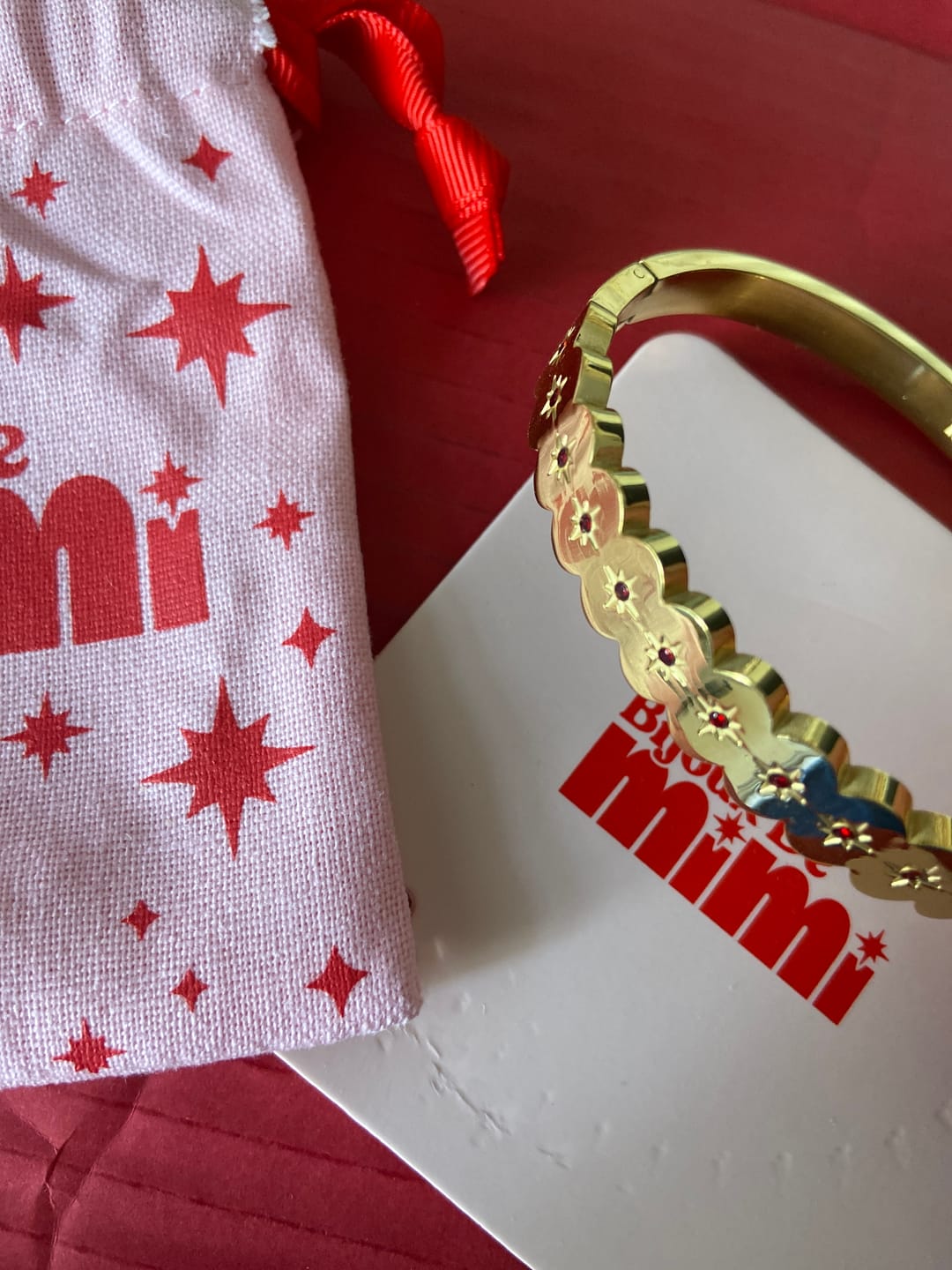 Customer photo review of Tallulah Gold Red Scallop Star Bangle