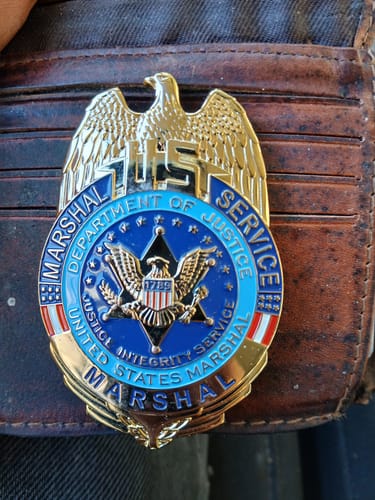 Customer photo review of US Marshal Service Eagle Badge Solid Copper Replica Movie Props