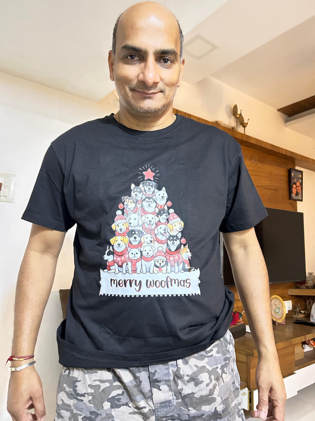 Customer photo review of "Merry Woofmas" T-Shirt – Cute Dog Christmas Tree Design for Dog Lovers | Unisex Fit