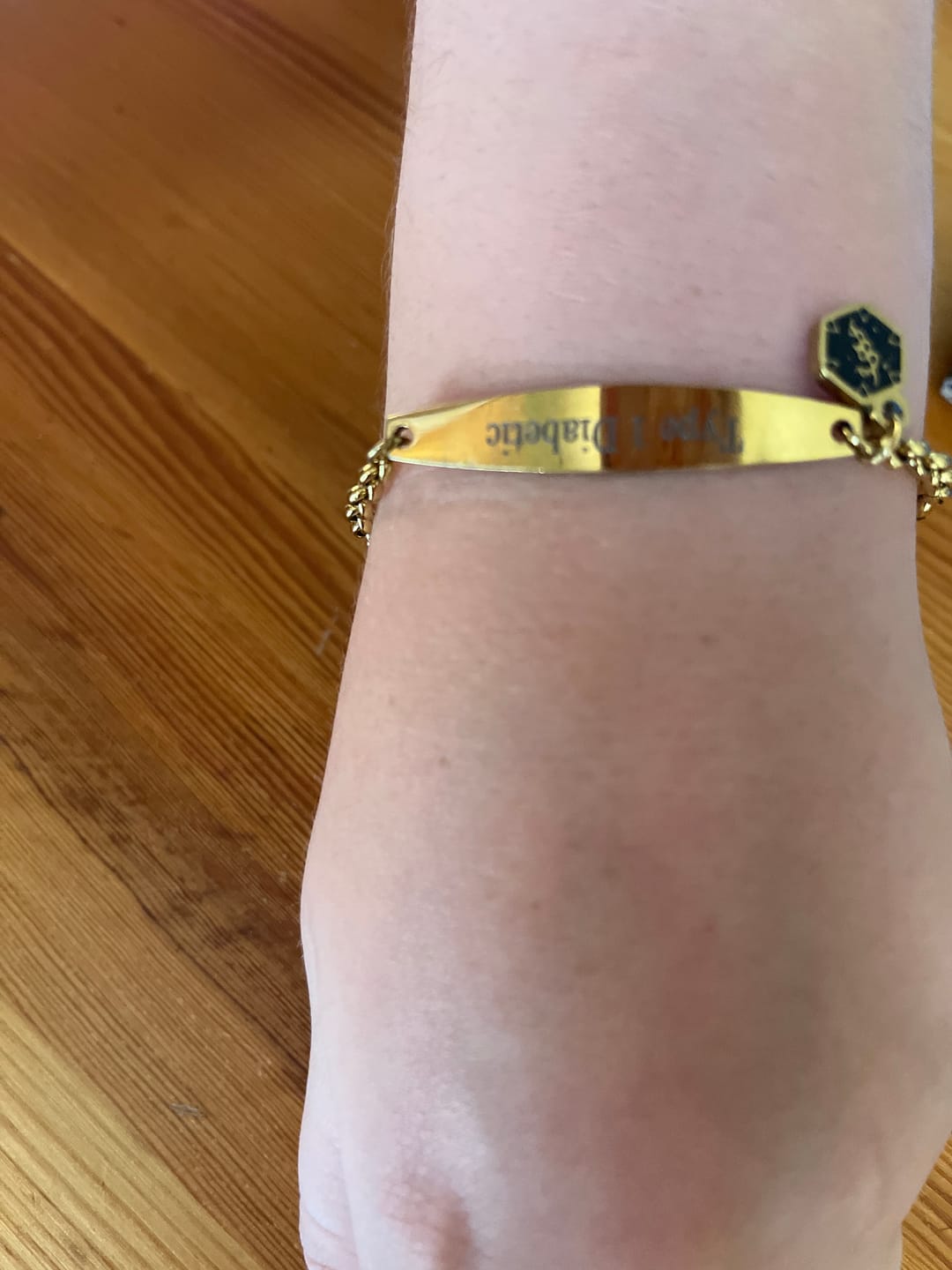 Customer photo review of Gold Colour Medical Alert Bracelet with Medical Charm