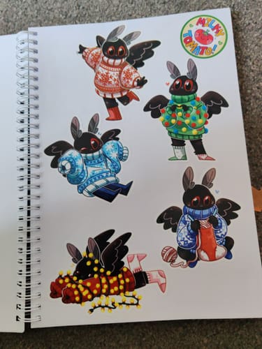 Customer photo review of Mothman Sweater Weather Stickers