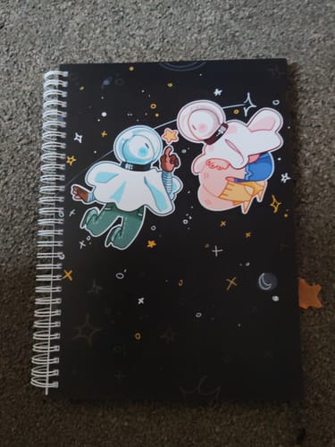 Customer photo review of Space Ghosts Duo Large Reusable Sticker Book