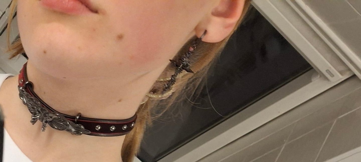 Customer photo review of "Taboo Rose" 24K Gold Plated Statement Rose Sword Dangle Earrings