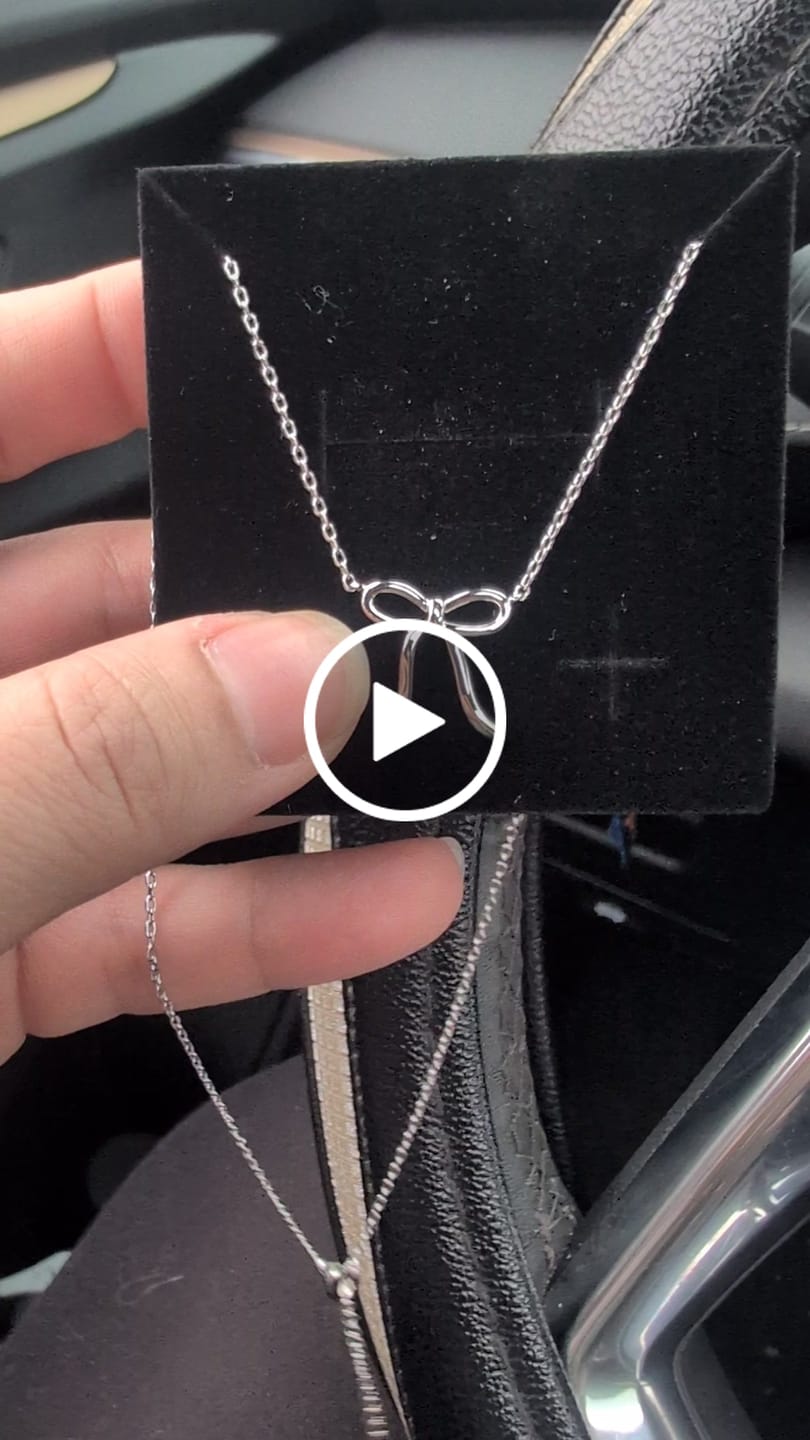 Customer video review of Lola 18k White Gold Plated Ribbon/Bow Pendant Necklace