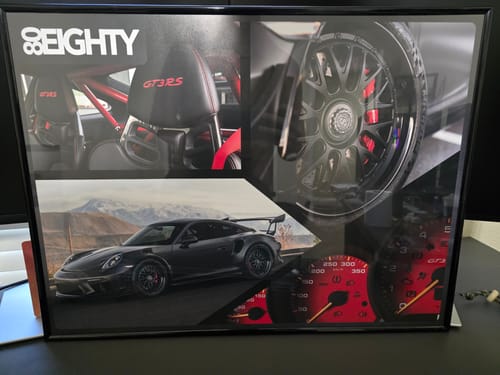 Customer's framed 80Eighty DCG#85 Collage Poster, showing details of a black Porsche GT3 RS.