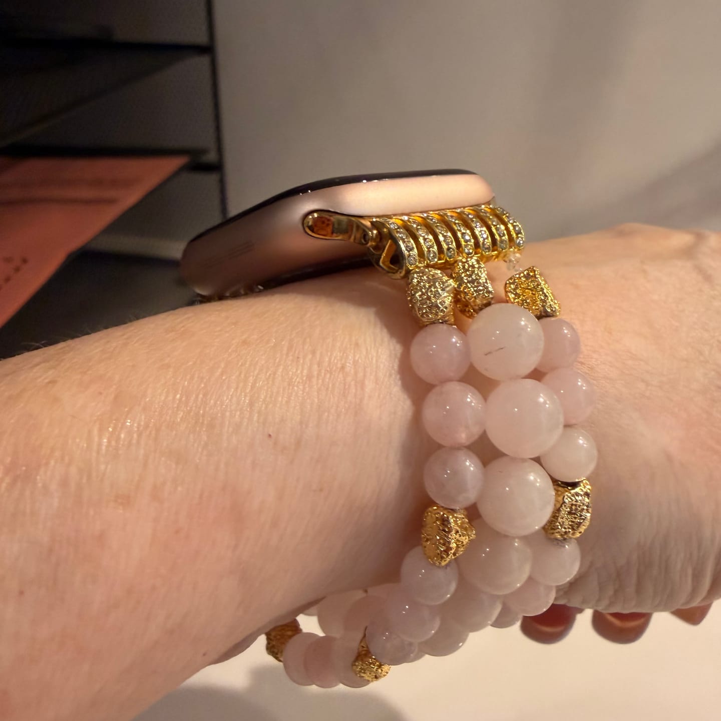 Customer photo review of Rose Quartz Stretch Apple Watch Strap