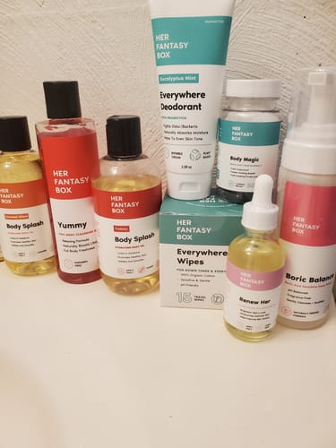 Reviewer's collection of Her Fantasy Box products, including the Boric Balance foaming wash, displayed on a counter.
