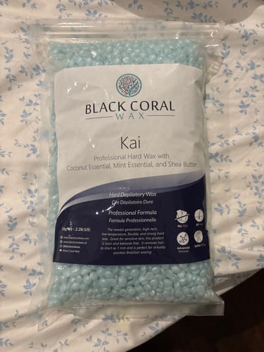 Customer's bag of professional, light blue hard wax beads.