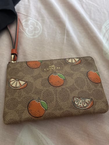 Customer photo review of COACH ORANGES WRISTLET