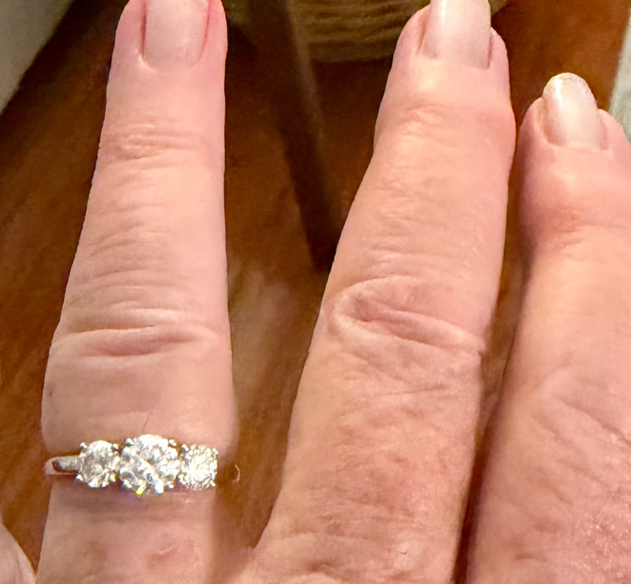 Customer photo review of Classic Three Stone Round Cut Moissanite Engagement Ring
