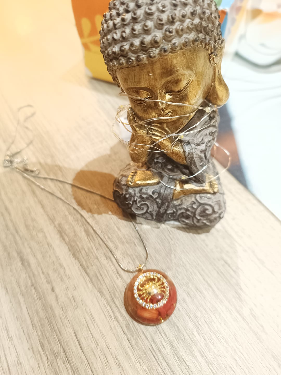 Customer photo review of Pendentif Orgonite "Signe Astrologique" en Pierre Naturelle