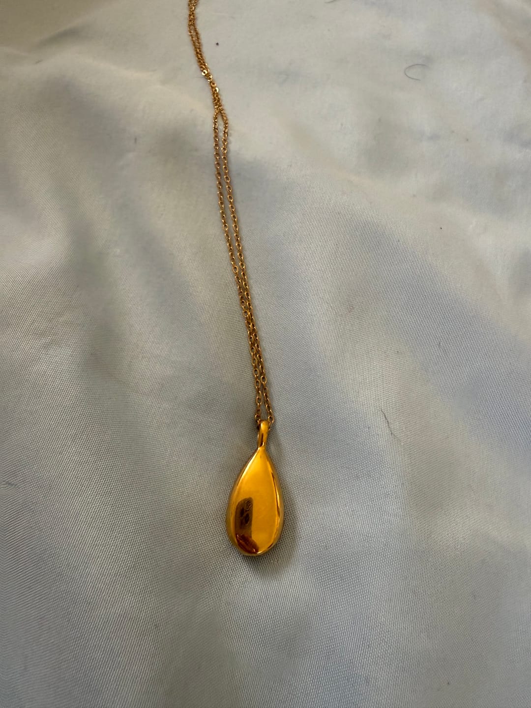 Customer photo review of Drop Cremation Urn Necklace Tears of Love for Ashes-A018