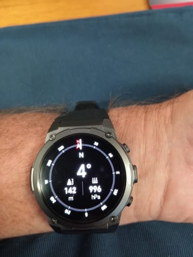 Reviewer's Gard Pro Ultra 3 watch on their wrist, showing the compass, altimeter, and pressure display.