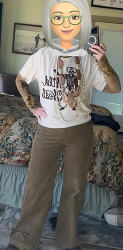 Reviewer in a full-length photo wearing the olive Judy Blue wide-leg corduroy pants.