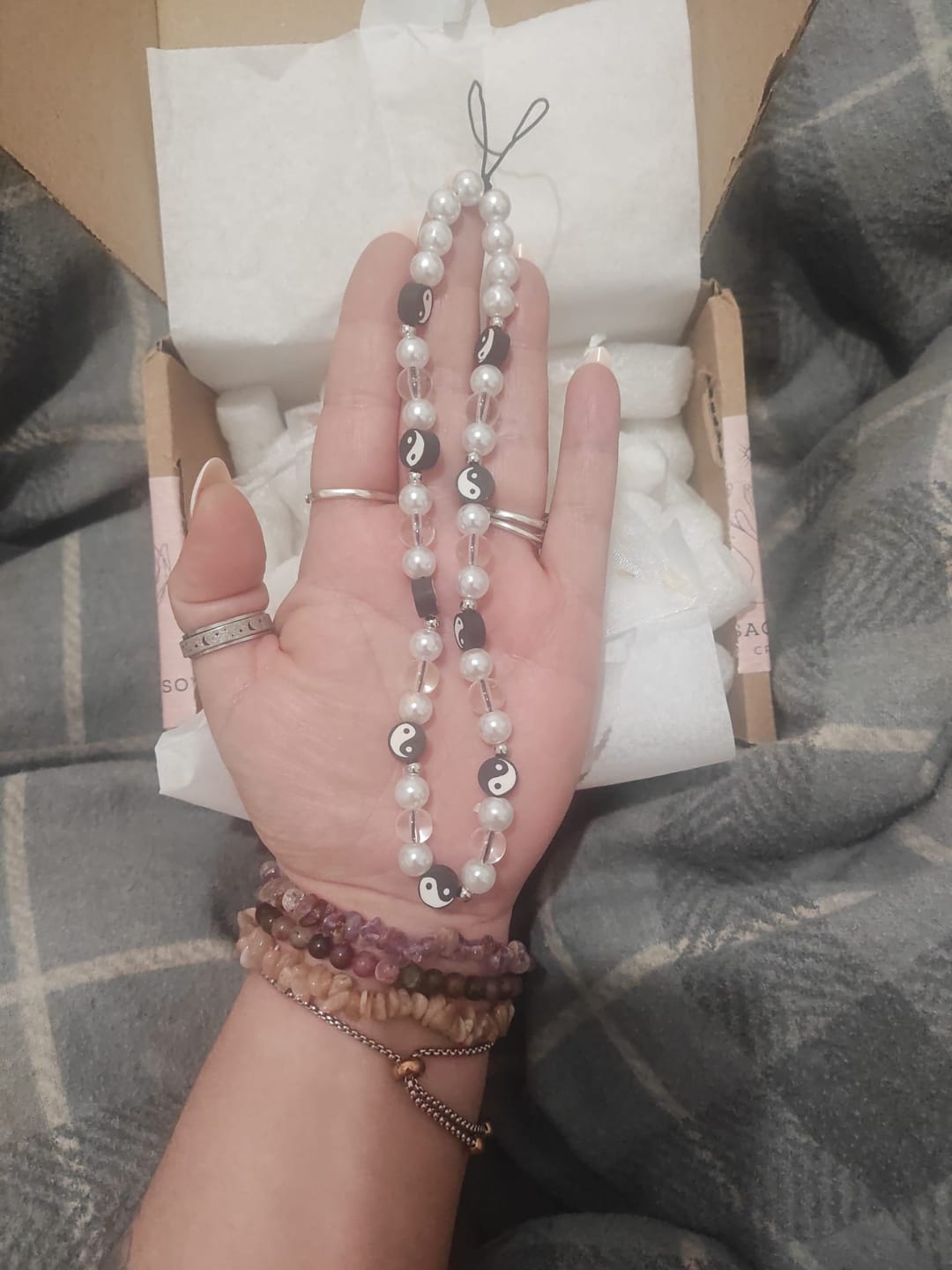 Customer photo review of Yin Yang Phone Charm