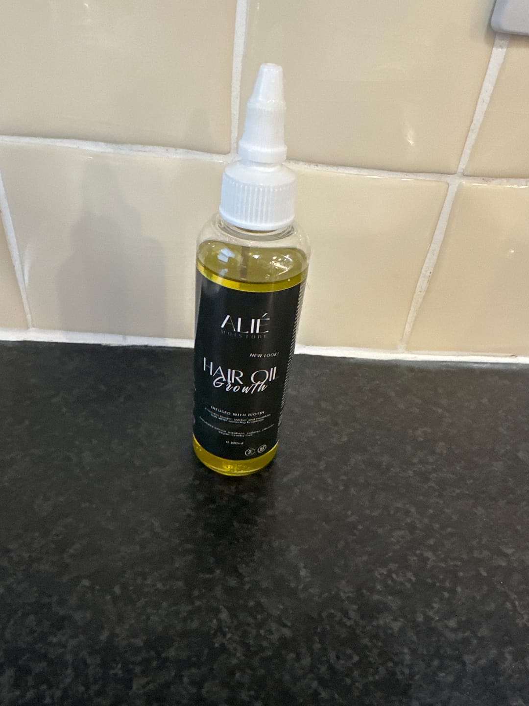 Customer photo review of ALIÉ MOISTURE'S HAIR OIL