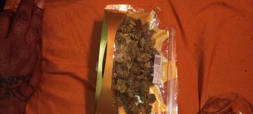 Customer photo review of Tangerine Dream THCA Trim Ounce (28g)