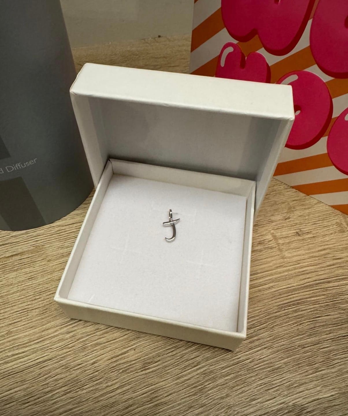 Customer photo review of Molto Initial Charm Pendants