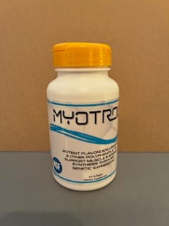 Customer's Boost Collagen Combo in a white bottle with a yellow cap, shown on a table.