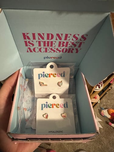 Customer photo review of Pastel Dinosaur Earrings