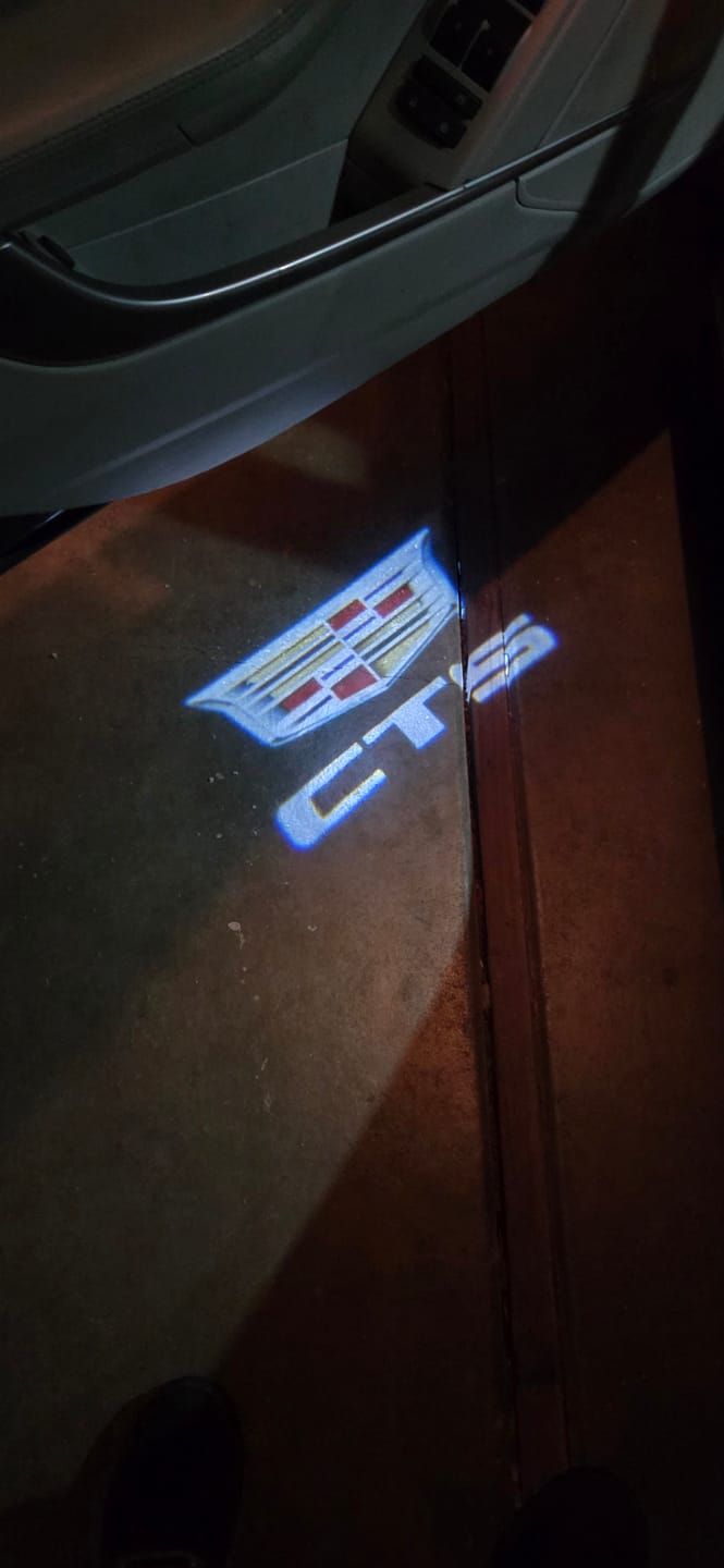 Customer photo review of CADILLAC  CTS LOGO PROJECTOT LIGHTS Nr.2640 (quantity 1 = 2 Logo Films /2 door lights）