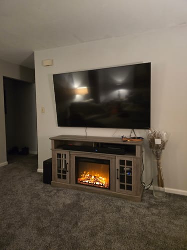 Customer photo review of Astorga 58" Glass Door Modern Farmhouse Fireplace TV Stand