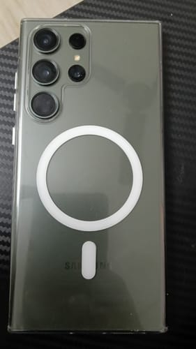 Customer's phone, protected by the UltraShield Tempered Glass, shown from the back in a clear case.