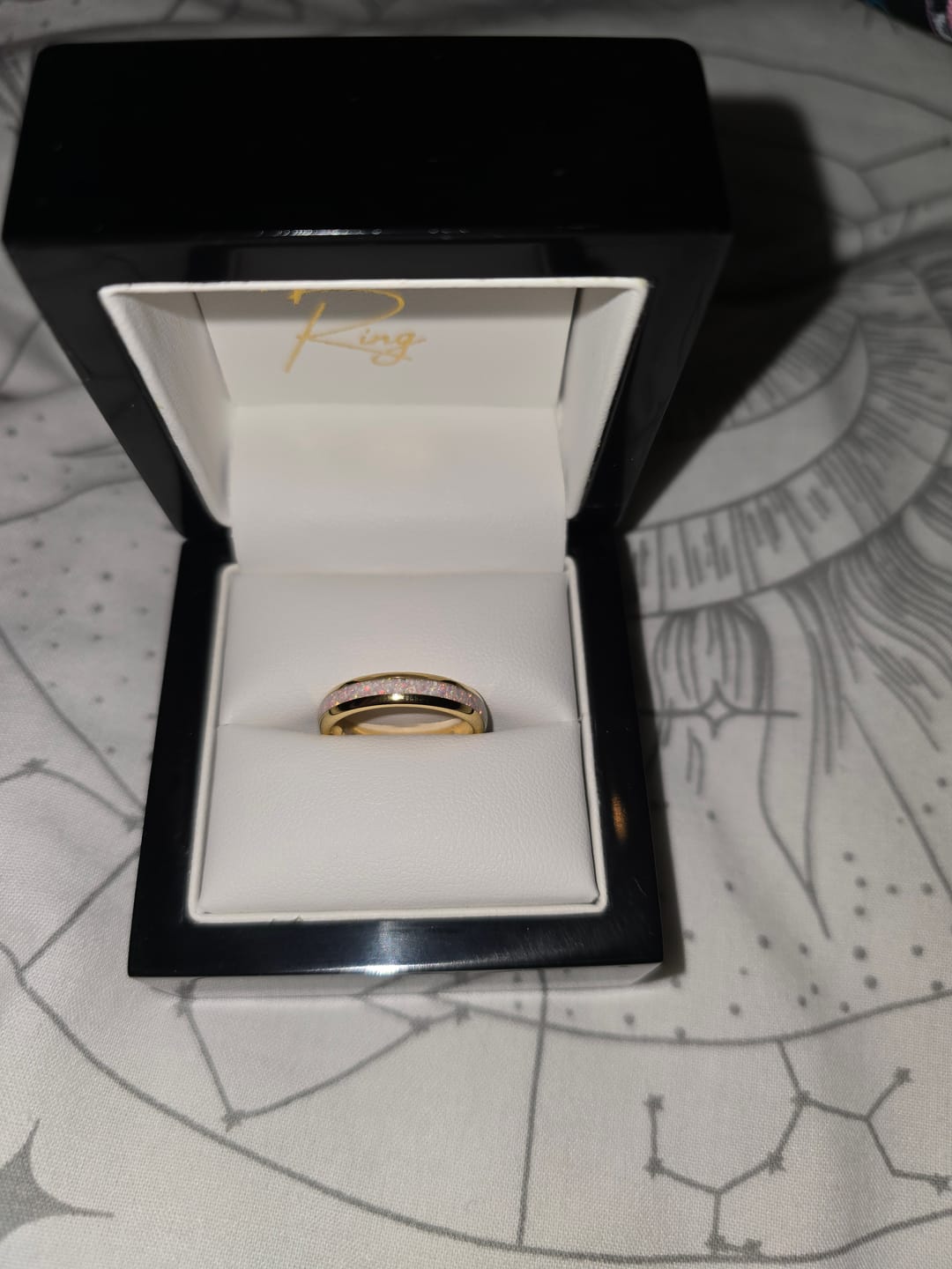 Customer photo review of The Golden White Opal 4mm Wonder Ring