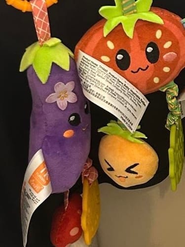 Customer photo review of Hanging Plush Baby Rattle with Teether – Stroller Toy for Babies