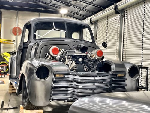 Customer's custom truck build with an exposed twin-turbo engine, the project for which the oil catch can was purchased.