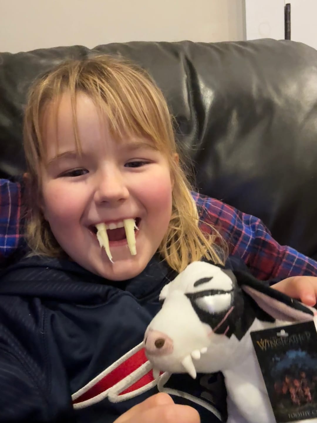 Customer photo review of Toothy Cow Plushie
