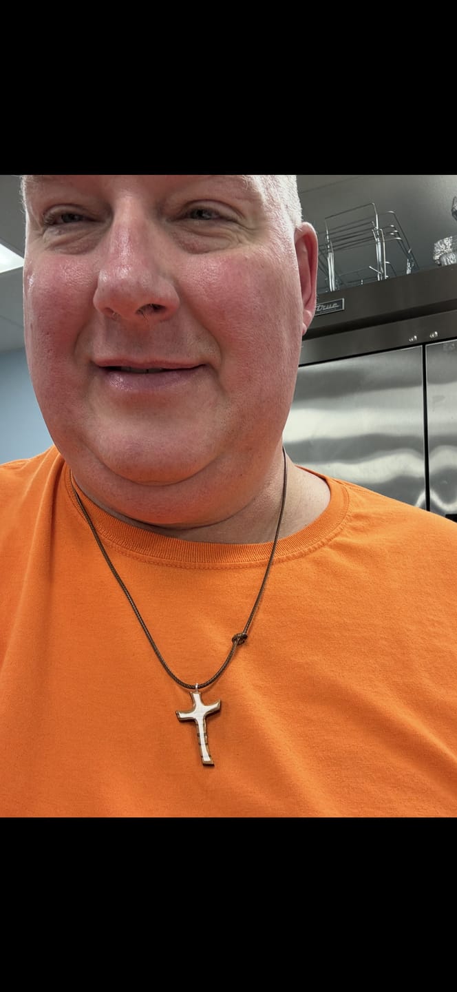 Customer photo review of Holy Land Olive Wood Cross Pendant