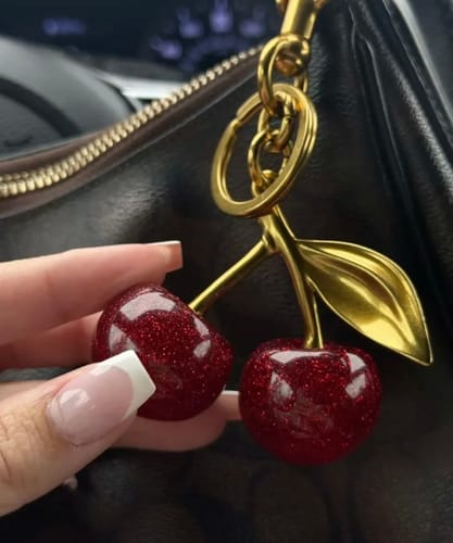 Customer photo review of Coach cherry appliqué