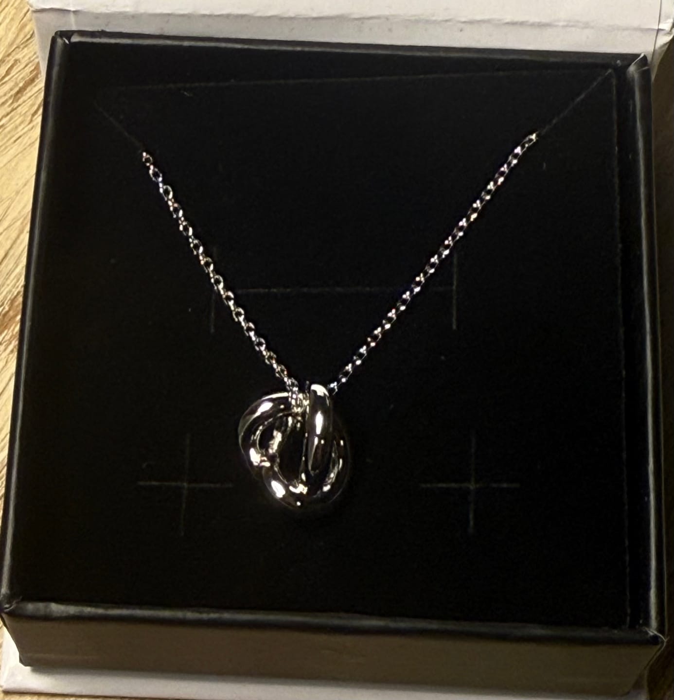 Customer photo review of Ashley 18k White Gold Plated Knot Pendant Necklace