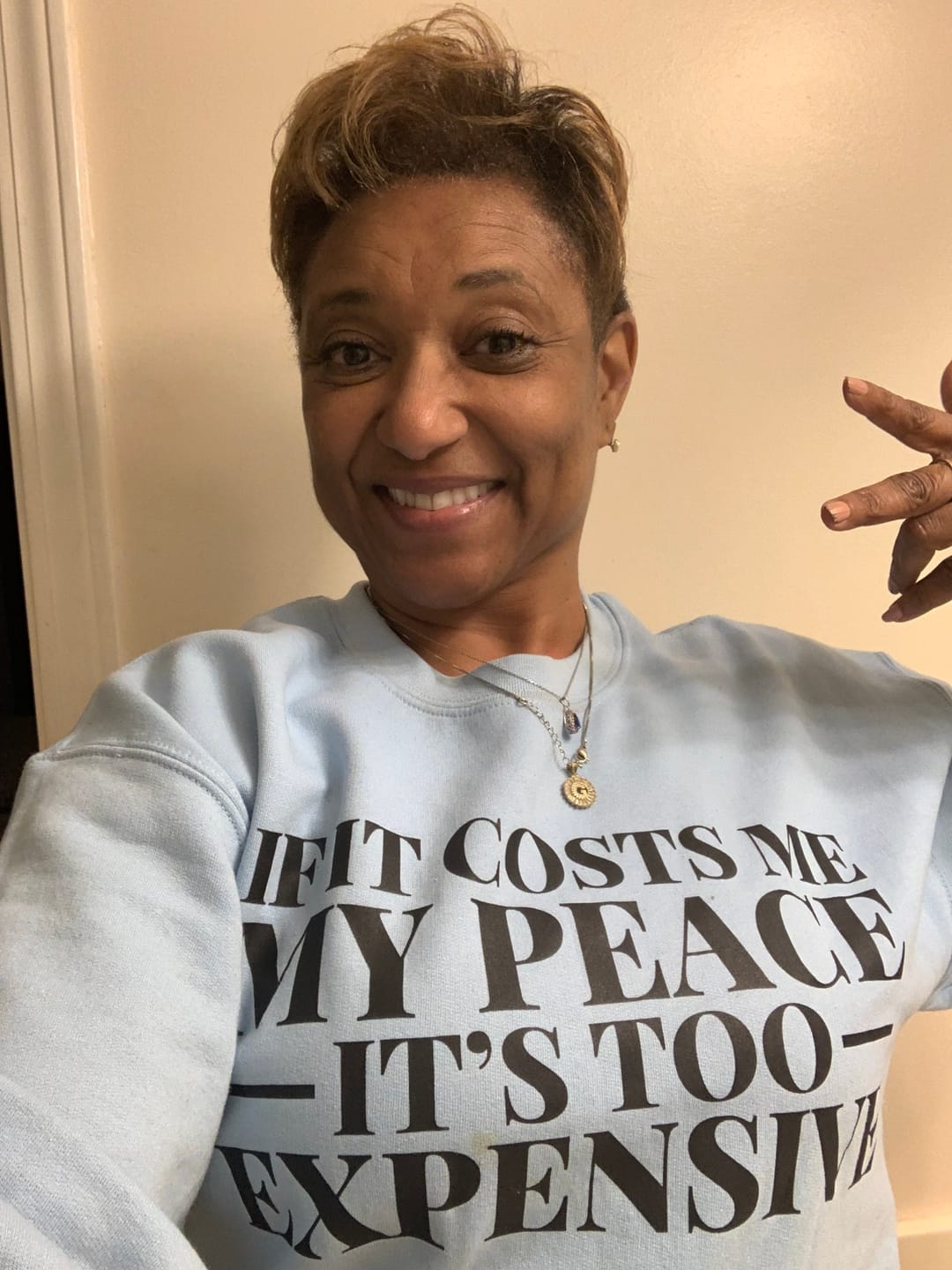 Customer photo review of It's Too Expensive Sweatshirt