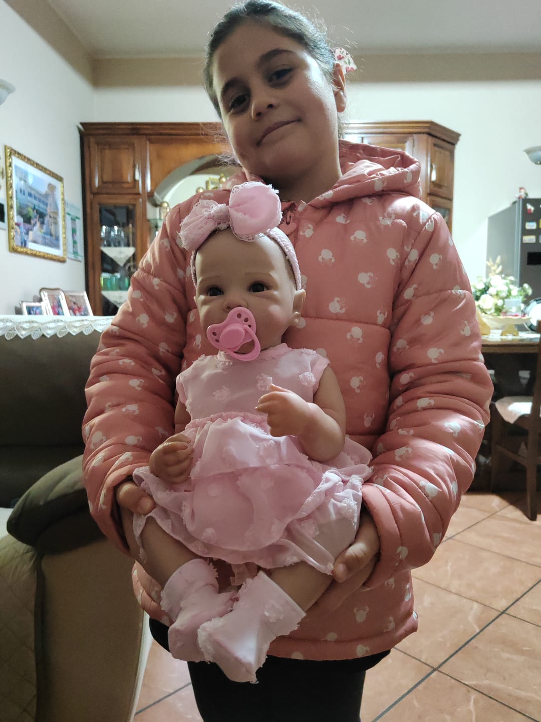Customer photo review of Bambola reborn full silicone vinile altamente realistica - BETTIE