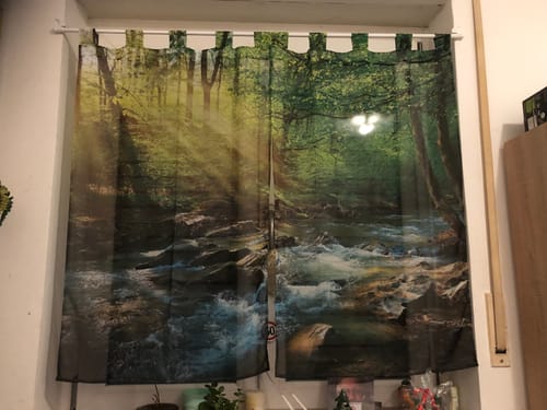 Customer photo review of Fotovorhang "Sonne strahlt durch den Wald"