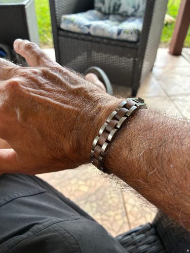 Customer wearing the Bowie Frontiersman Bracelet, showing the steel and wood links on their wrist.